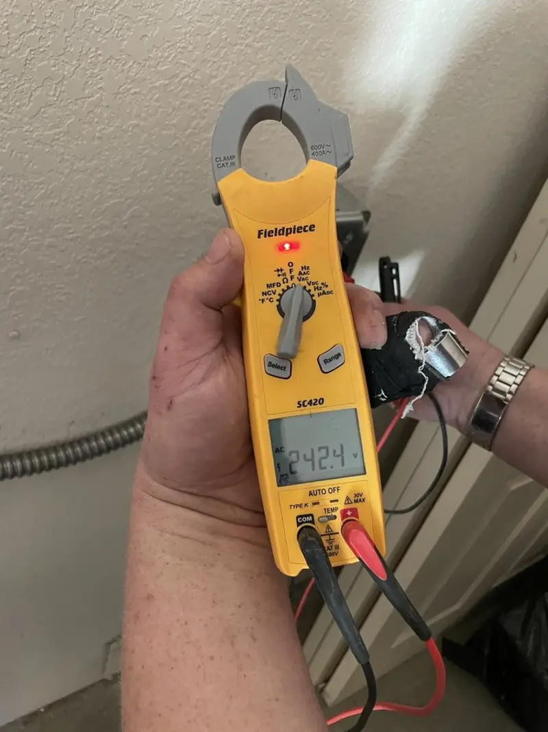 Voltage testing with clamp meter during Hot Tub / Pool Electrical Wiring in Monticello